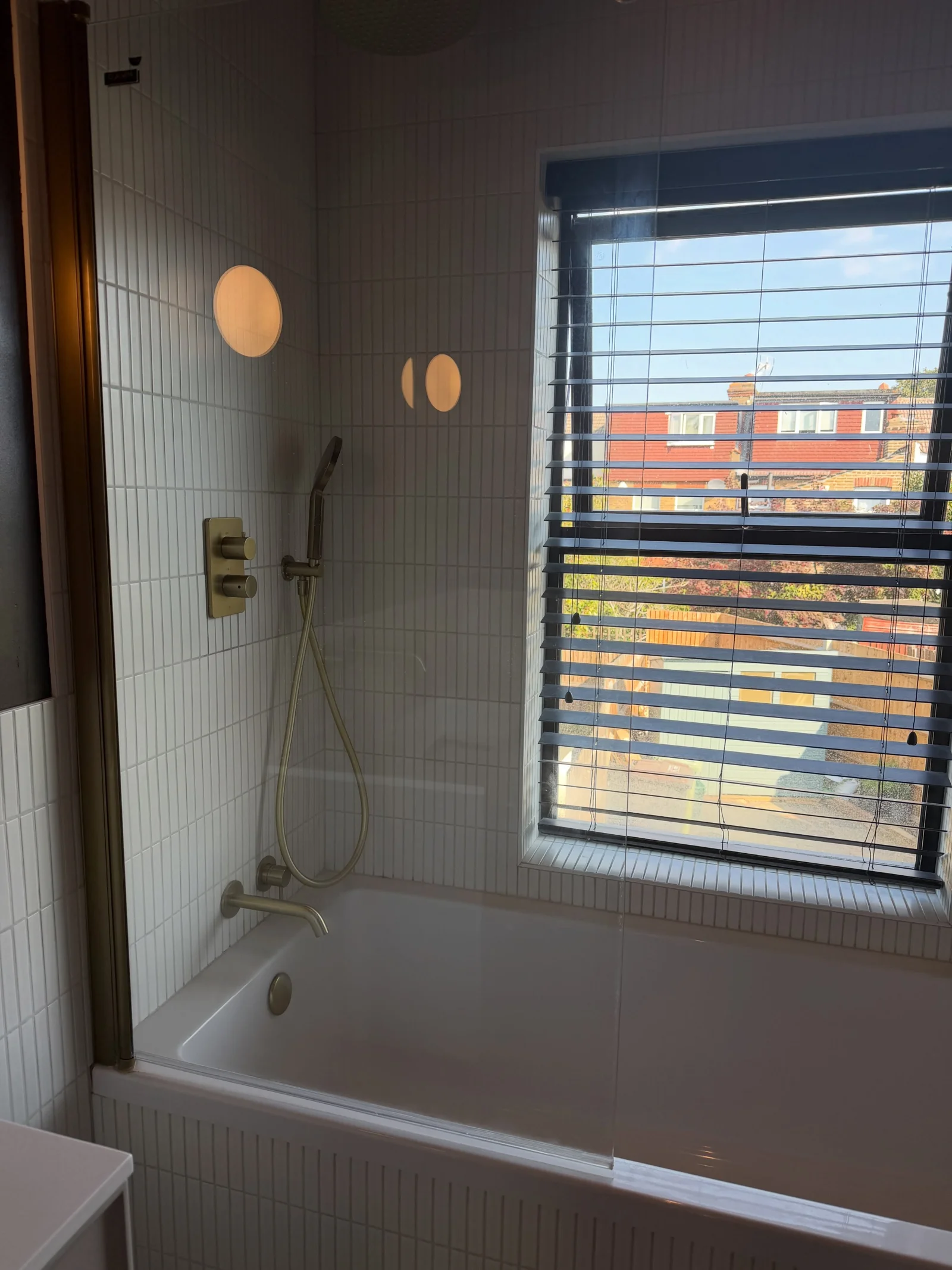A clean bath and glass screen from Afterglow’s Instagram feed